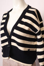 Woolrich Pullover von Labelstorys, aus weicher Wolle, in neutraler Farbe, mit Rundhalsausschnitt und klassischen Strickmustern.